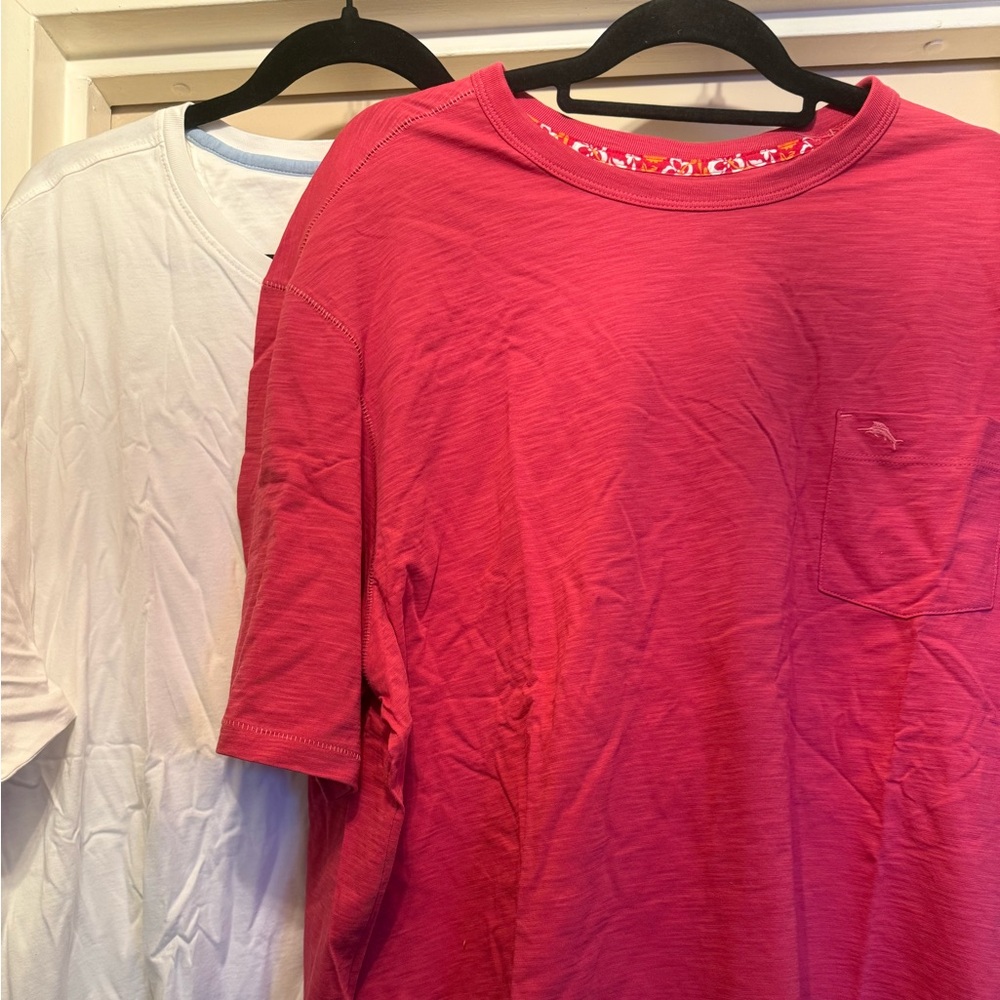 2  pocketbt shirts 
white and orangeish